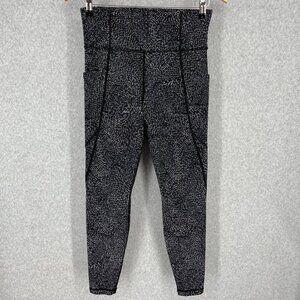 Athleta Salutation Stash Pocket Rainwater Tight Size S Black Neutral Athletic